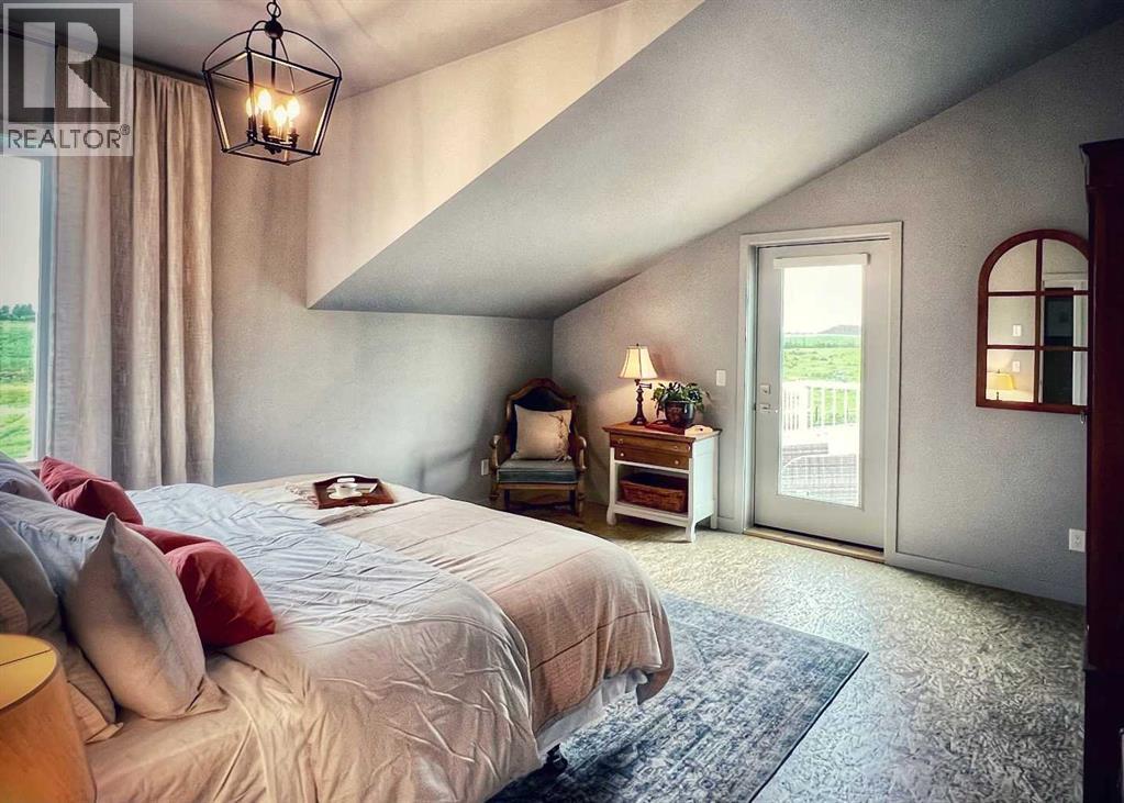 254069 Towers Trail, Rural Rocky View County, Alberta  T4C 2A3 - Photo 47 - A2302358