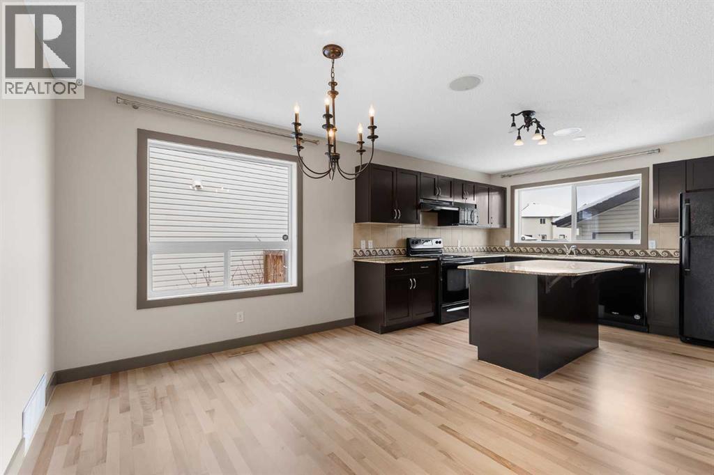 106 Luxstone Way SW, Airdrie, Alberta  T4B 0H6 - Photo 7 - A2290938