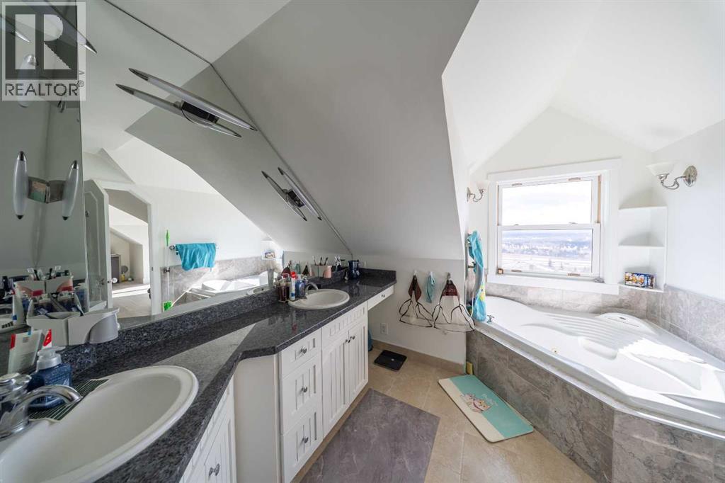 39 Slopes Grove Sw, Calgary, Alberta  T3H 3Y6 - Photo 15 - A2299187