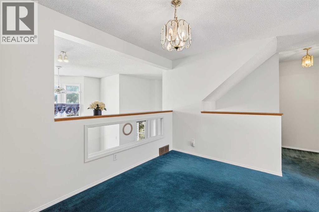 404 Hawkstone Manor Nw, Calgary, Alberta  T3G 3X2 - Photo 12 - A2301076