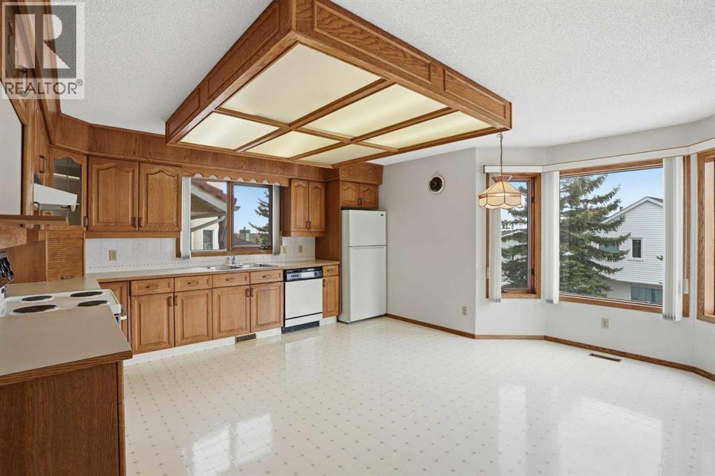 163 Sandringham Road NW, Calgary, Alberta  T3K 3Y5 - Photo 10 - A2302839