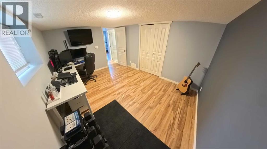 466 Cimarron Boulevard, Okotoks, Alberta  T1S 0H7 - Photo 15 - A2292029