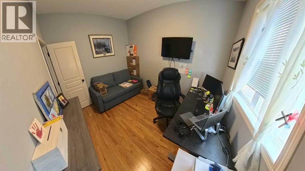 466 Cimarron Boulevard, Okotoks, Alberta  T1S 0H7 - Photo 14 - A2292029