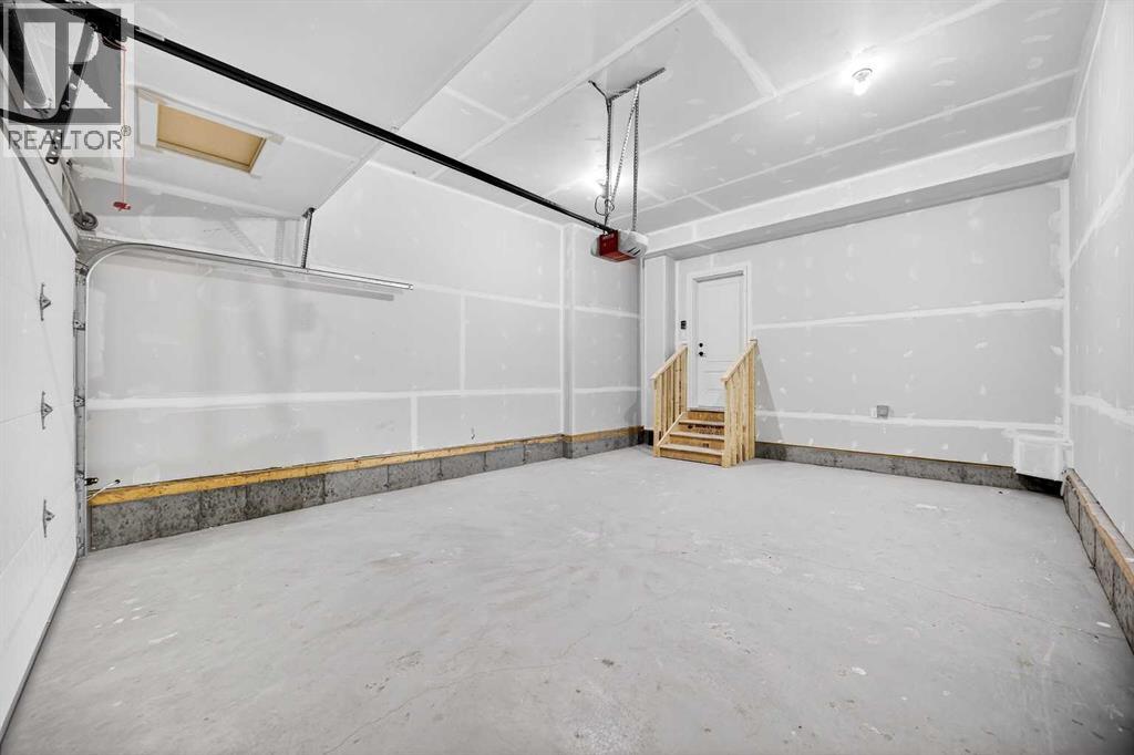 52 Fireside Common Sw, Cochrane, Alberta  T4C 3E1 - Photo 45 - A2286463