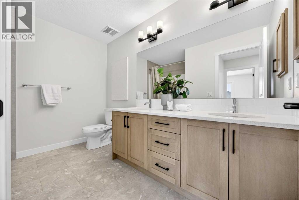 52 Fireside Common Sw, Cochrane, Alberta  T4C 3E1 - Photo 39 - A2286463