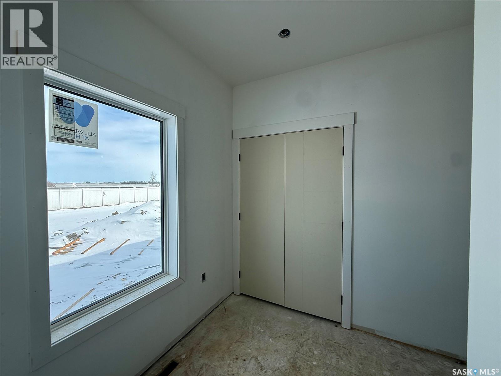860 Delaet Bay, Warman, Saskatchewan  S0K 4S0 - Photo 2 - SK033291