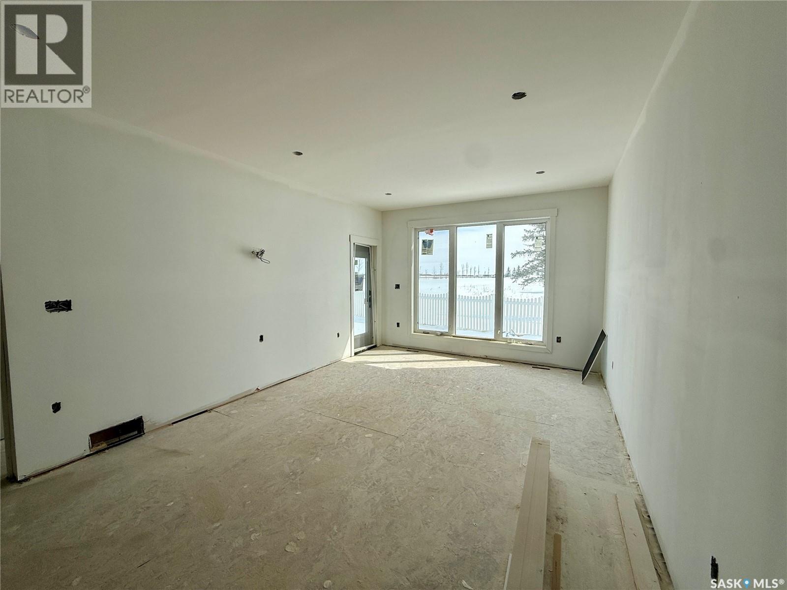 860 Delaet Bay, Warman, Saskatchewan  S0K 4S0 - Photo 5 - SK033291