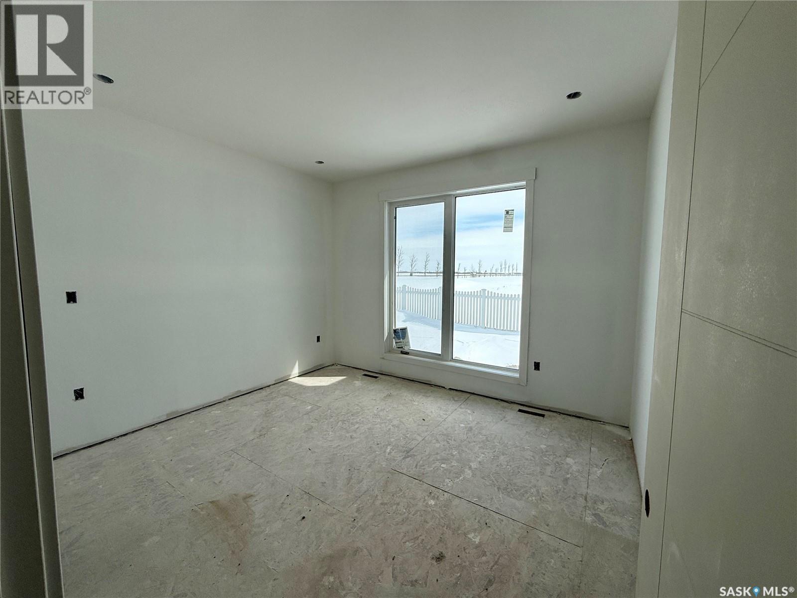 860 Delaet Bay, Warman, Saskatchewan  S0K 4S0 - Photo 6 - SK033291