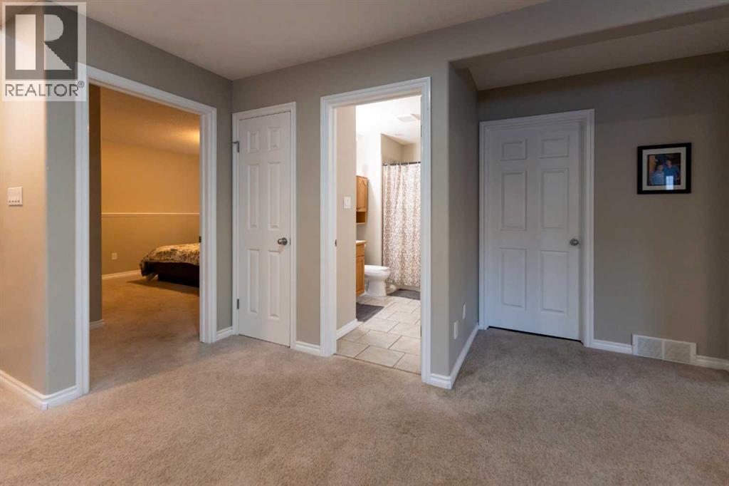 65 Heritage Circle W, Lethbridge, Alberta  T1K 7T3 - Photo 38 - A2289412