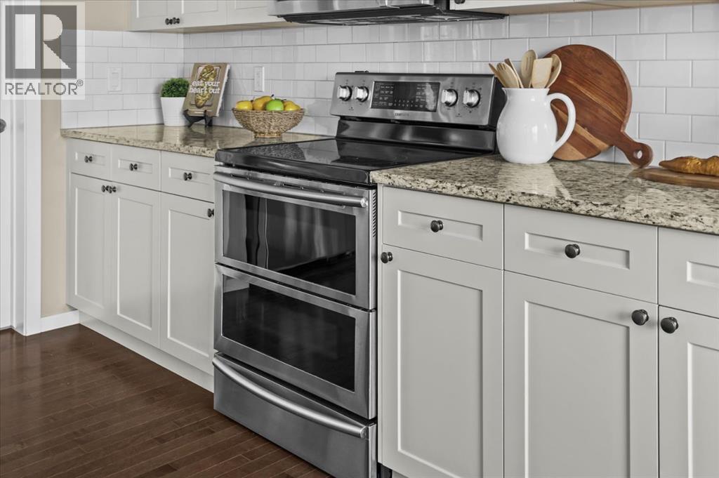 113 Tuscany Ridge Circle NW, Calgary, Alberta  T3L 0E5 - Photo 12 - A2300359