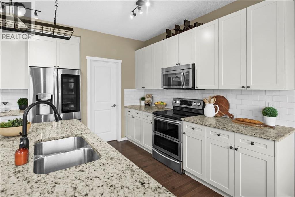 113 Tuscany Ridge Circle NW, Calgary, Alberta  T3L 0E5 - Photo 11 - A2300359