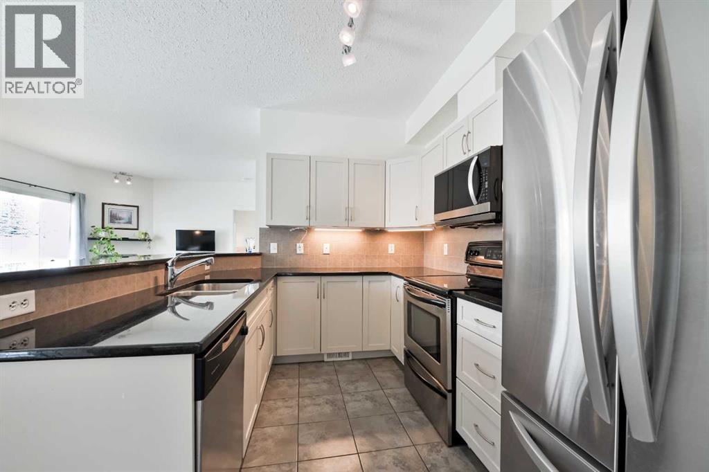 706, 281 Cougar Ridge Drive Sw, Calgary, Alberta  T3H 0J3 - Photo 7 - A2302541