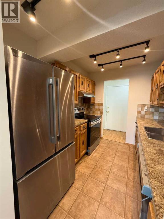 209, 2207 8 Avenue S, Lethbridge, Alberta  T1J 4G1 - Photo 12 - A2303125