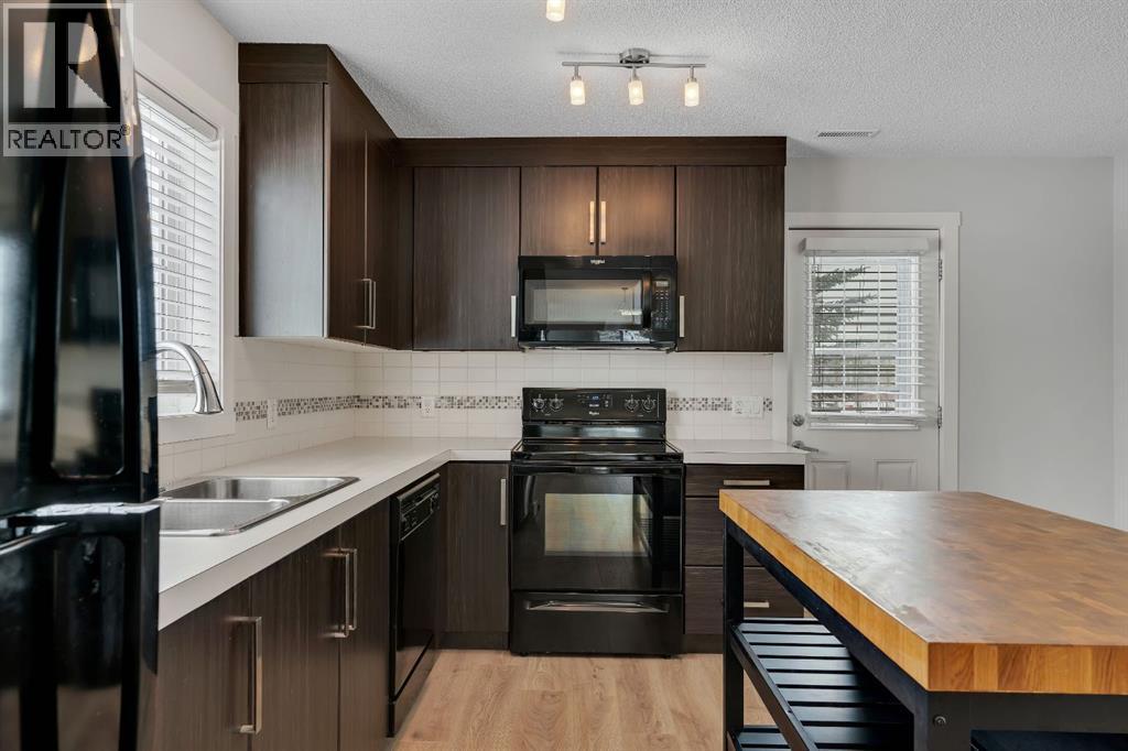 406 Mckenzie Towne Close SE, Calgary, Alberta  T2Z 1A9 - Photo 8 - A2302840