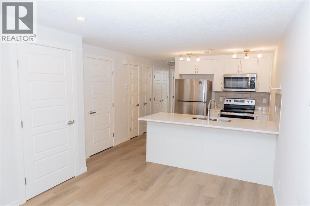 405, 474 Seton Circle, Calgary, Alberta  T3M 3P6 - Photo 3 - A2279098