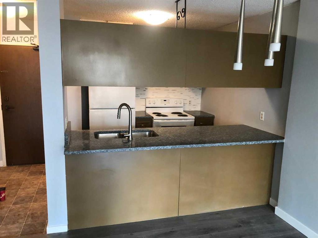 402, 738 3 Avenue Sw, Calgary, Alberta  T2P 0G7 - Photo 4 - A2303137