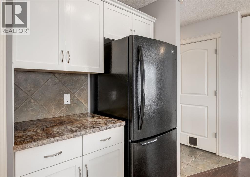 113 Luxstone Green Sw, Airdrie, Alberta  T4B 3B9 - Photo 9 - A2294849