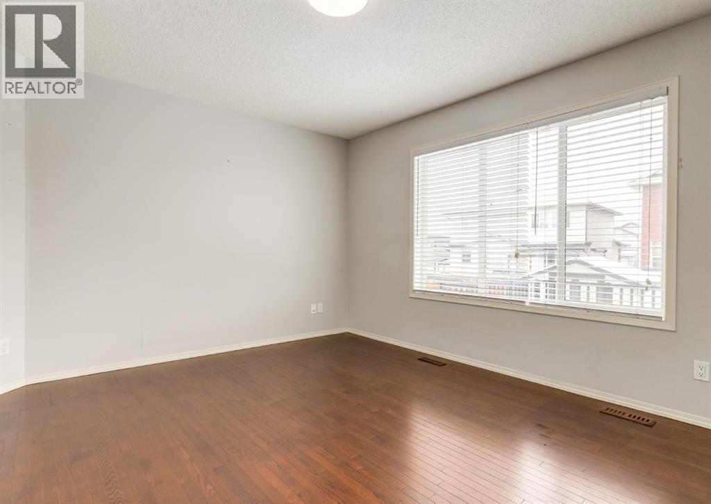 113 Luxstone Green Sw, Airdrie, Alberta  T4B 3B9 - Photo 3 - A2294849