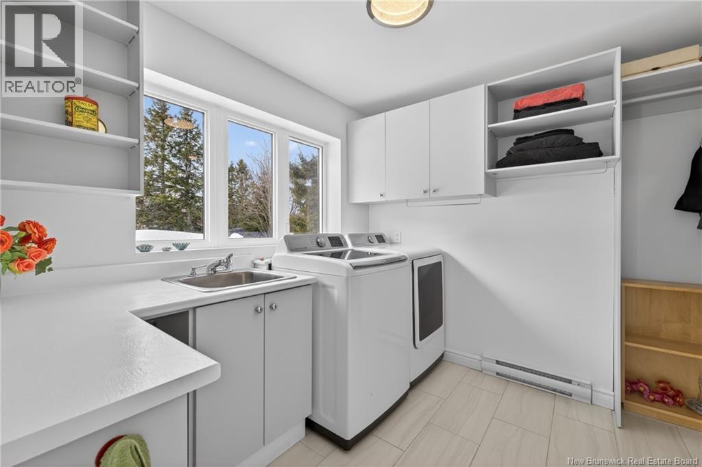 30 Reid Street, Charlo, New Brunswick  E8E 2R2 - Photo 4 - NB137400