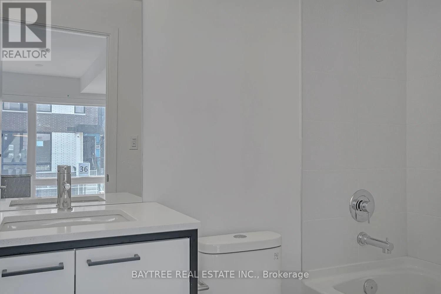 Th4 - 30 Ed Clark Gardens, Toronto, Ontario  M6N 0B5 - Photo 11 - W13015848