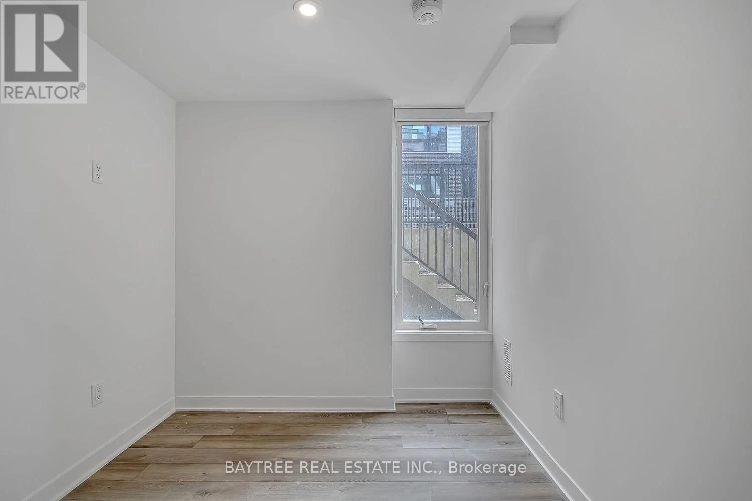 Th4 - 30 Ed Clark Gardens, Toronto, Ontario  M6N 0B5 - Photo 15 - W13015848