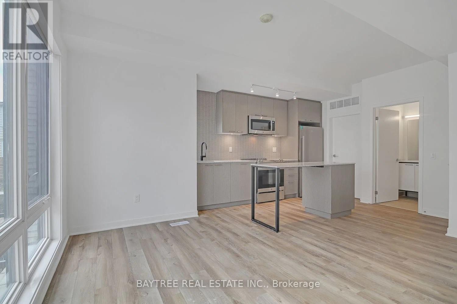 Th4 - 30 Ed Clark Gardens, Toronto, Ontario  M6N 0B5 - Photo 2 - W13015848