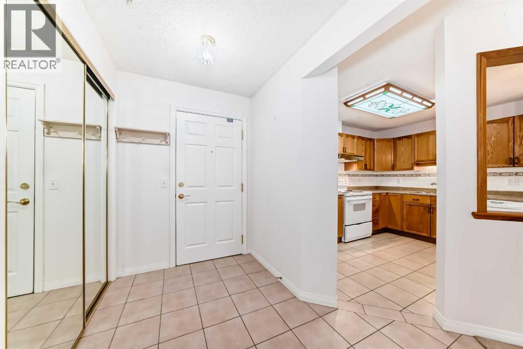 3202 Sienna Park Green Sw, Calgary, Alberta  T3H 3N7 - Photo 3 - A2292319