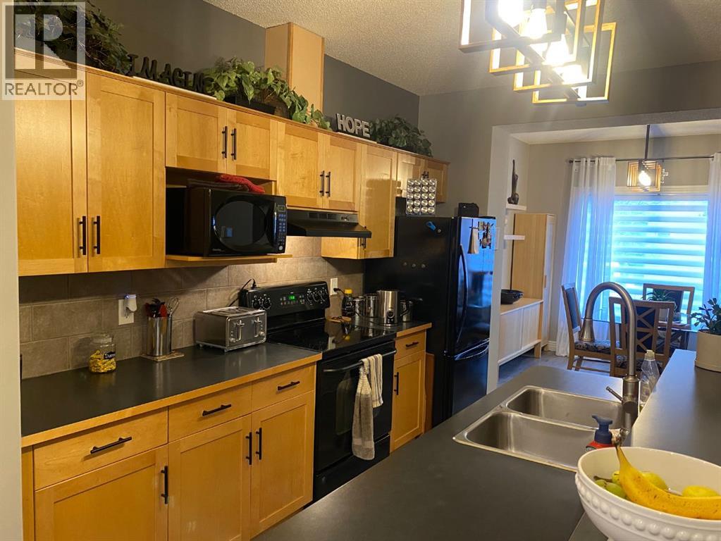 131 Bridlewood View SW, Calgary, Alberta  T2Z 3Y1 - Photo 6 - A2301041