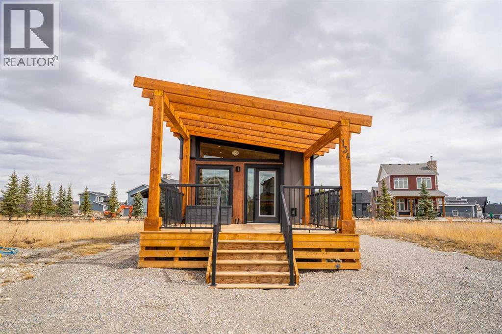 134 Cottageclub Court, Rural Rocky View County, Alberta  T4C 1B1 - Photo 2 - A2302815