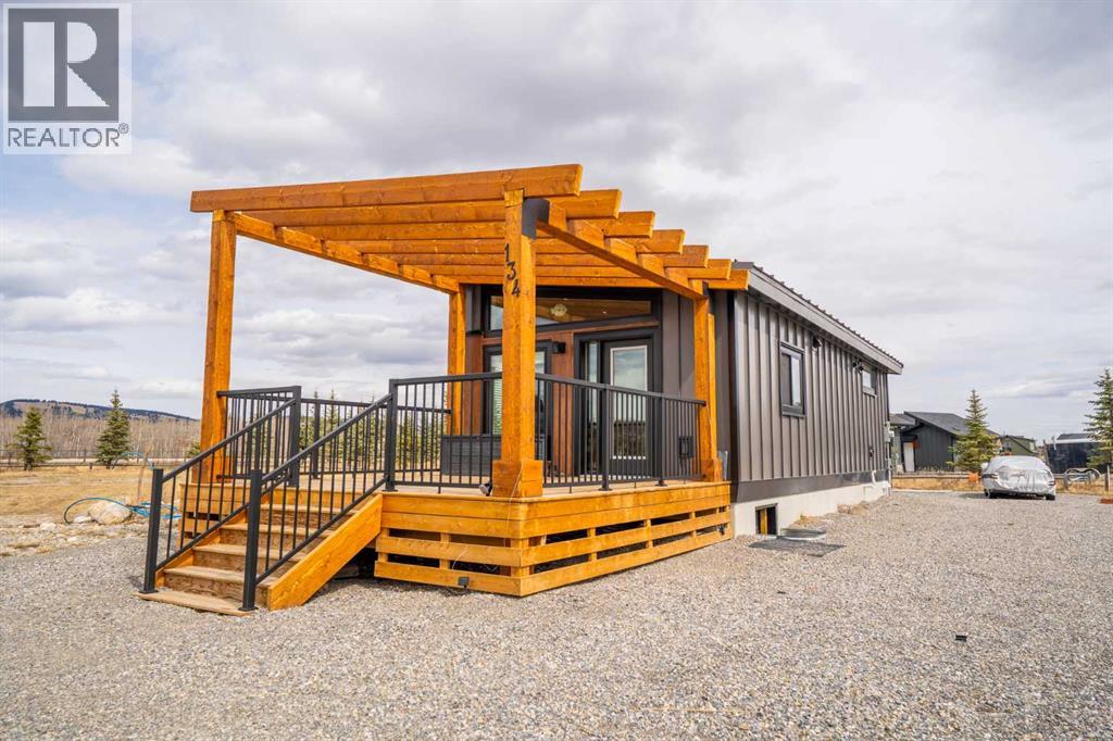 134 Cottageclub Court, Rural Rocky View County, Alberta  T4C 1B1 - Photo 1 - A2302815