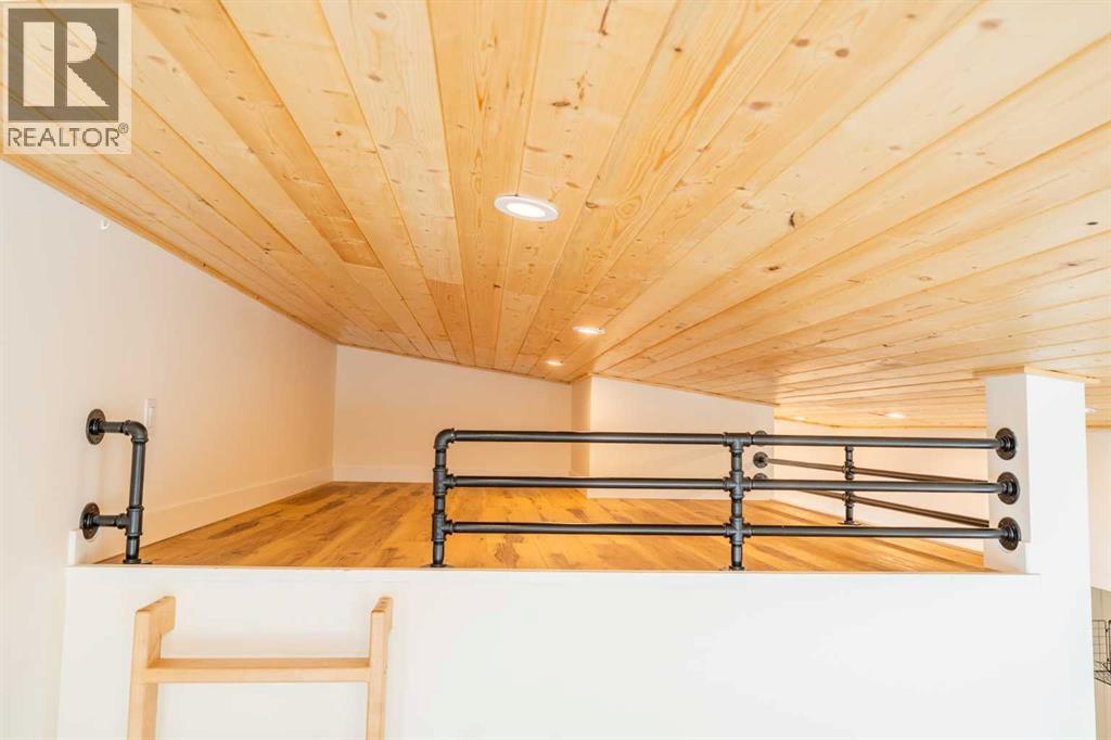 134 Cottageclub Court, Rural Rocky View County, Alberta  T4C 1B1 - Photo 17 - A2302815