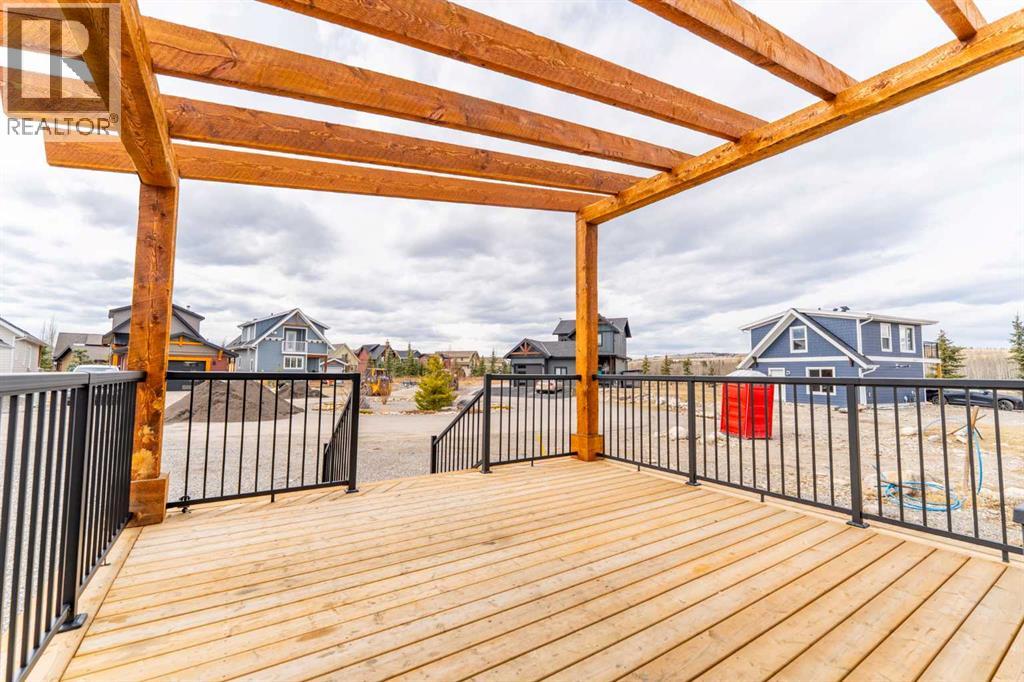 134 Cottageclub Court, Rural Rocky View County, Alberta  T4C 1B1 - Photo 8 - A2302815