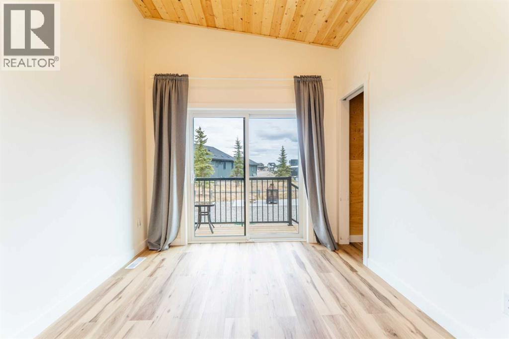 134 Cottageclub Court, Rural Rocky View County, Alberta  T4C 1B1 - Photo 30 - A2302815