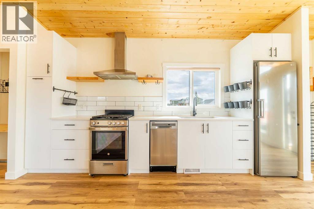 134 Cottageclub Court, Rural Rocky View County, Alberta  T4C 1B1 - Photo 11 - A2302815