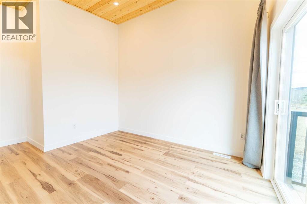 134 Cottageclub Court, Rural Rocky View County, Alberta  T4C 1B1 - Photo 28 - A2302815