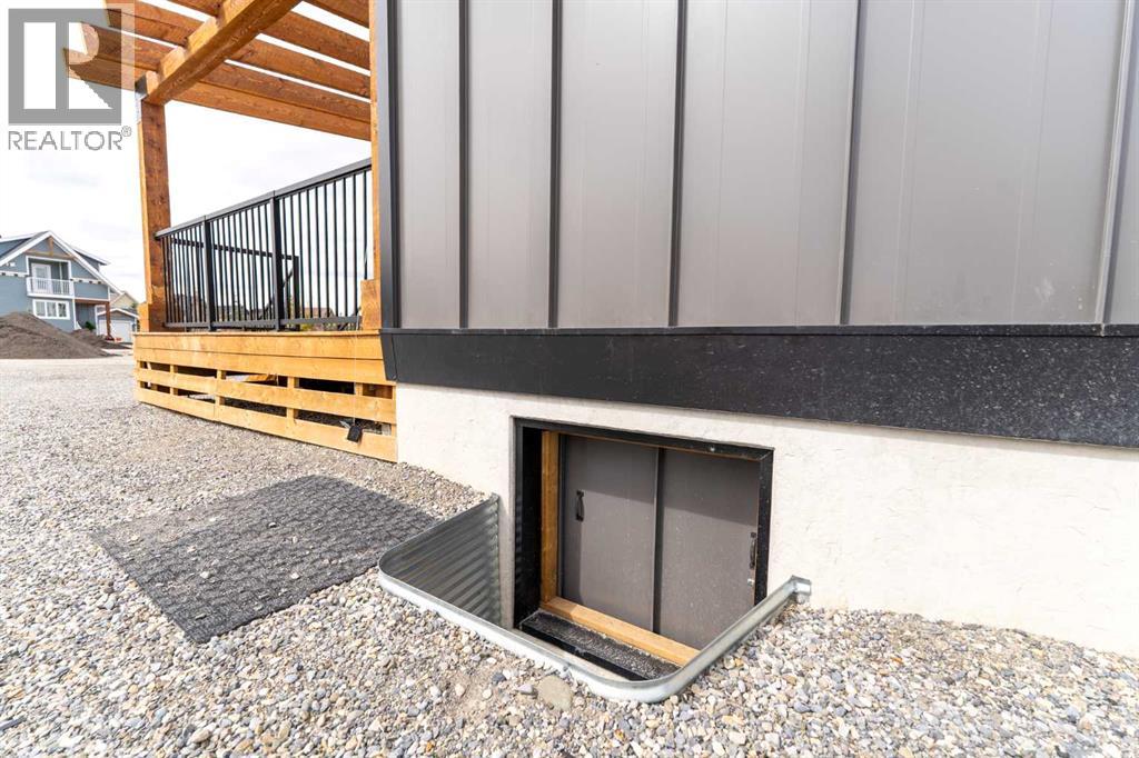 134 Cottageclub Court, Rural Rocky View County, Alberta  T4C 1B1 - Photo 33 - A2302815