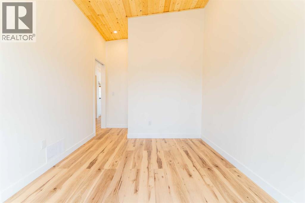 134 Cottageclub Court, Rural Rocky View County, Alberta  T4C 1B1 - Photo 29 - A2302815