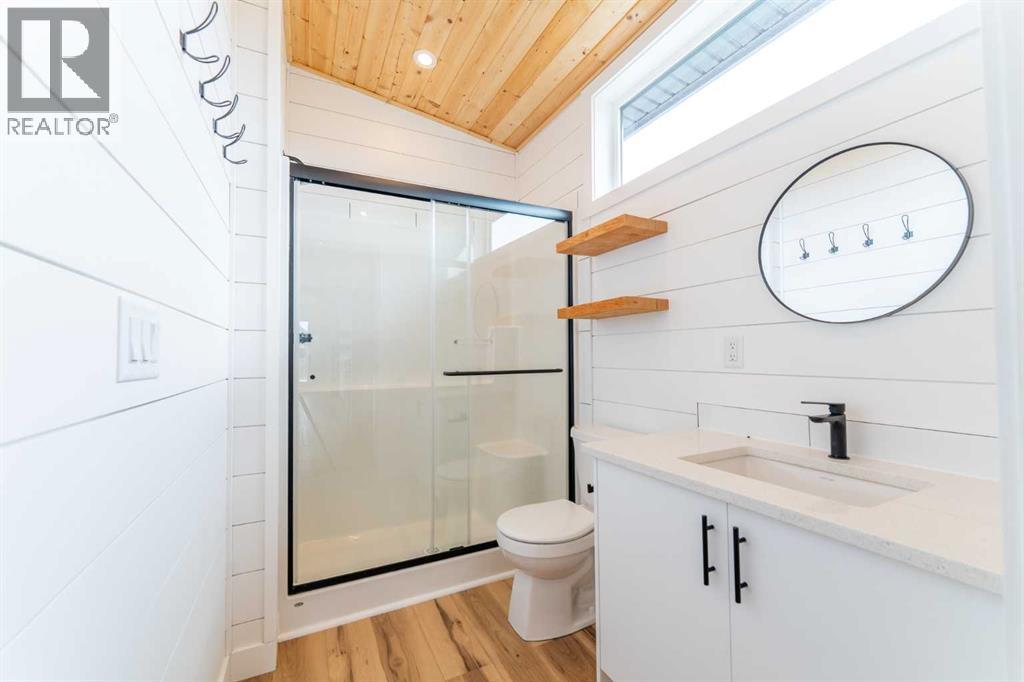 134 Cottageclub Court, Rural Rocky View County, Alberta  T4C 1B1 - Photo 21 - A2302815