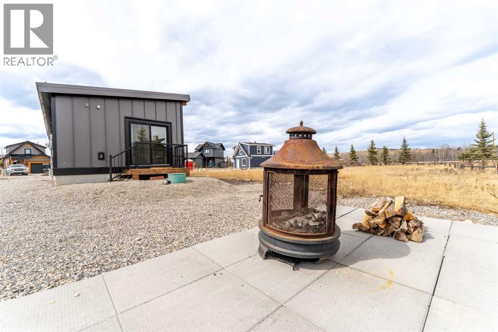 134 Cottageclub Court, Rural Rocky View County, Alberta  T4C 1B1 - Photo 32 - A2302815