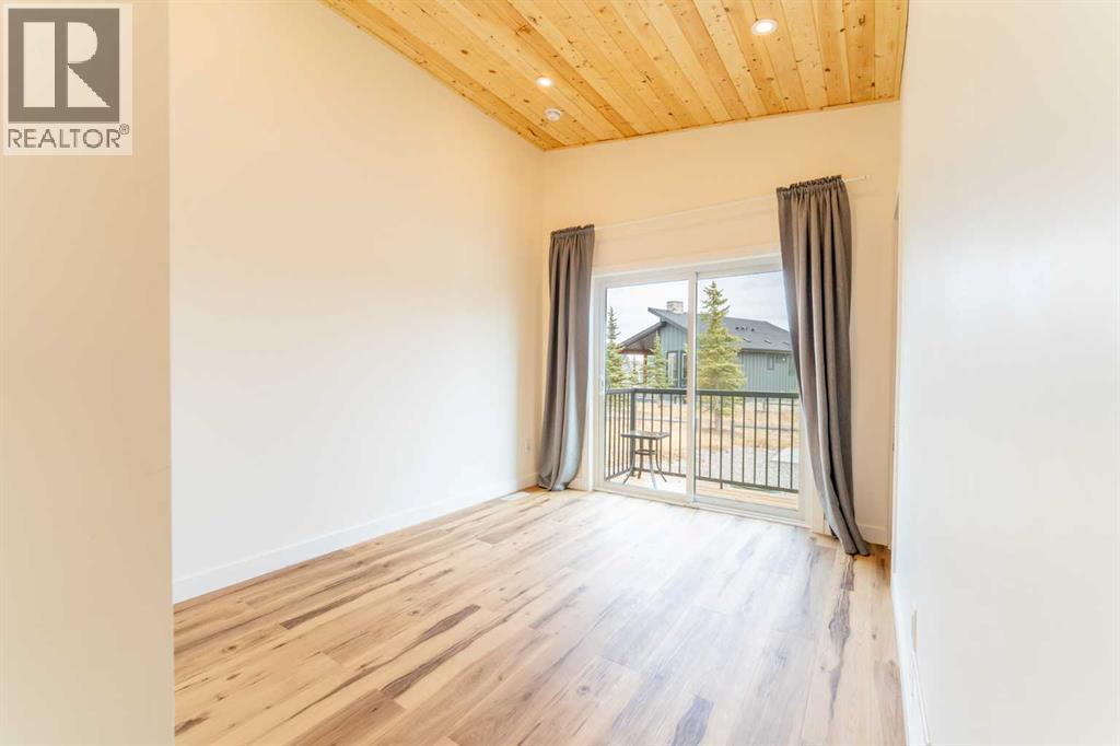 134 Cottageclub Court, Rural Rocky View County, Alberta  T4C 1B1 - Photo 27 - A2302815