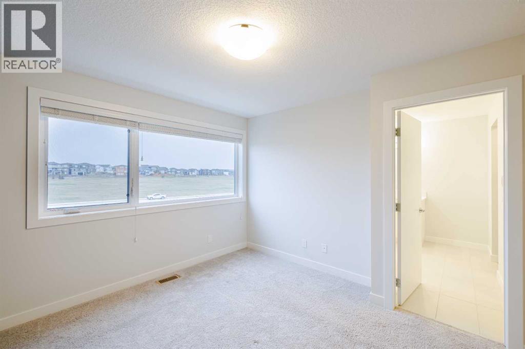 213 Alpine Rush View, Rural Rocky View County, Alberta  T3Z 0E7 - Photo 32 - A2281731