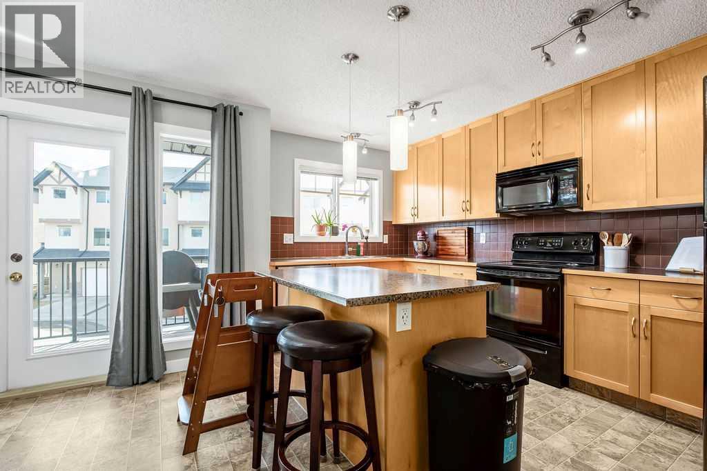 72 Cimarron Vista Gardens, Okotoks, Alberta  T1S 0G3 - Photo 9 - A2301892