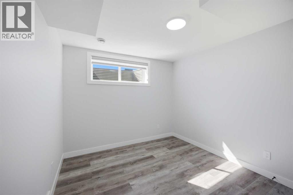 1153 Chinook Gate Bay Sw, Airdrie, Alberta  T4B 5J1 - Photo 38 - A2303098