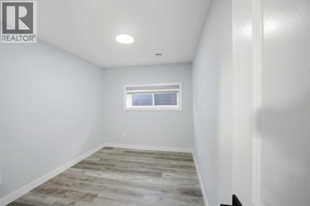 1153 Chinook Gate Bay Sw, Airdrie, Alberta  T4B 5J1 - Photo 37 - A2303098