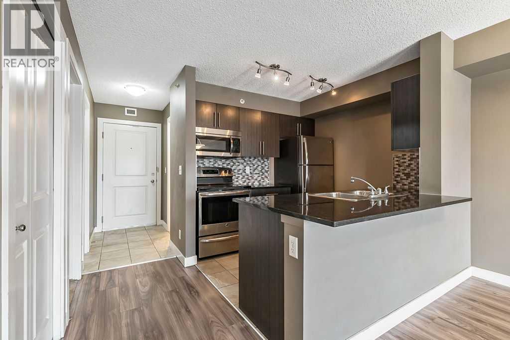 9410, 403 Mackenzie Way SW, Airdrie, Alberta  T4B 3V7 - Photo 9 - A2300726