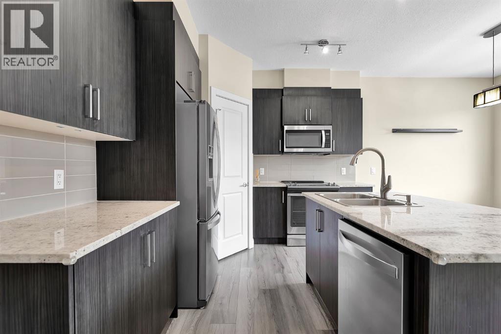 249 Sage Hill Grove Nw, Calgary, Alberta  T3R 0Z8 - Photo 4 - A2299623