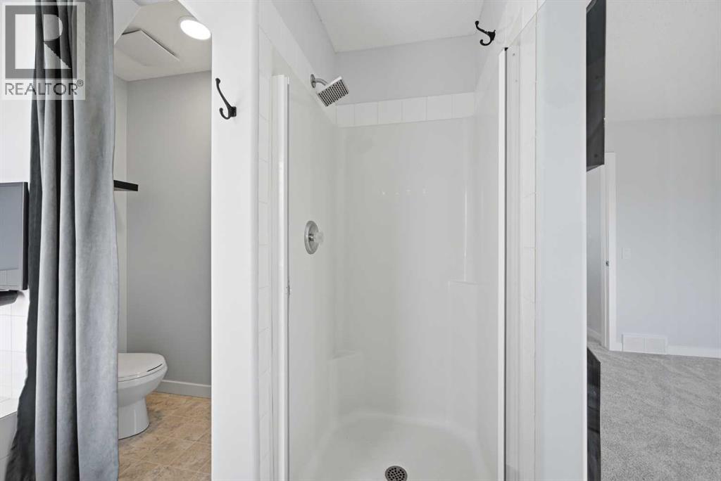 69 Bridleridge Road Sw, Calgary, Alberta  T2Y 4E1 - Photo 28 - A2302273