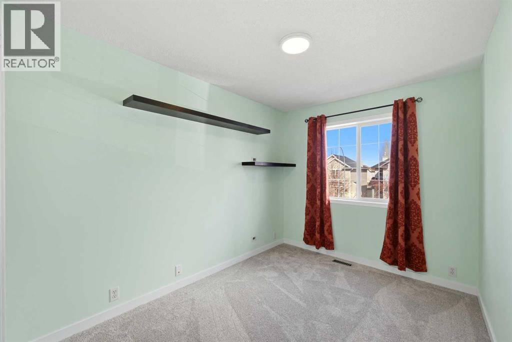 69 Bridleridge Road Sw, Calgary, Alberta  T2Y 4E1 - Photo 30 - A2302273