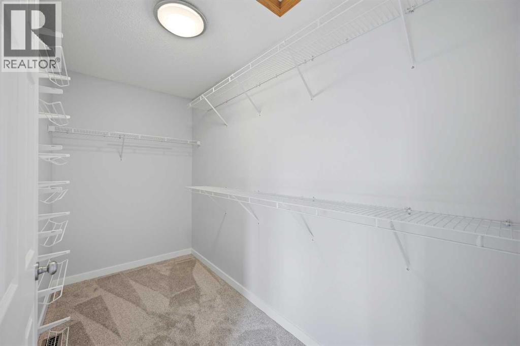 69 Bridleridge Road Sw, Calgary, Alberta  T2Y 4E1 - Photo 29 - A2302273
