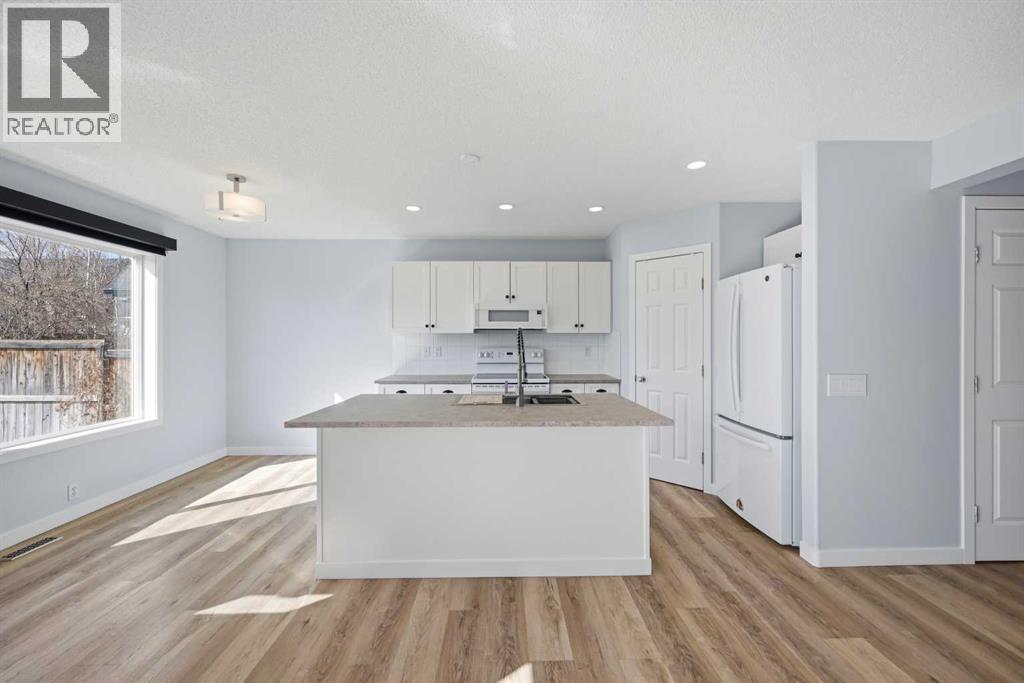 69 Bridleridge Road Sw, Calgary, Alberta  T2Y 4E1 - Photo 11 - A2302273